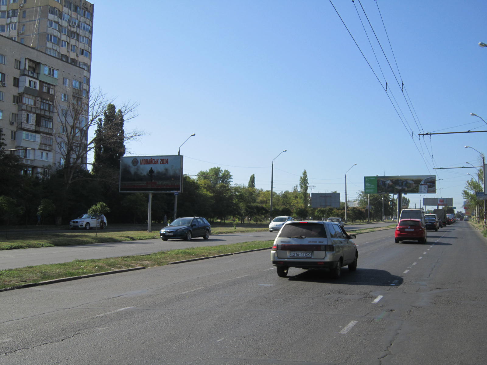 Фото рекламної площини  просп. Маршала Жукова (навпроти дому 91) на роздільній смузі