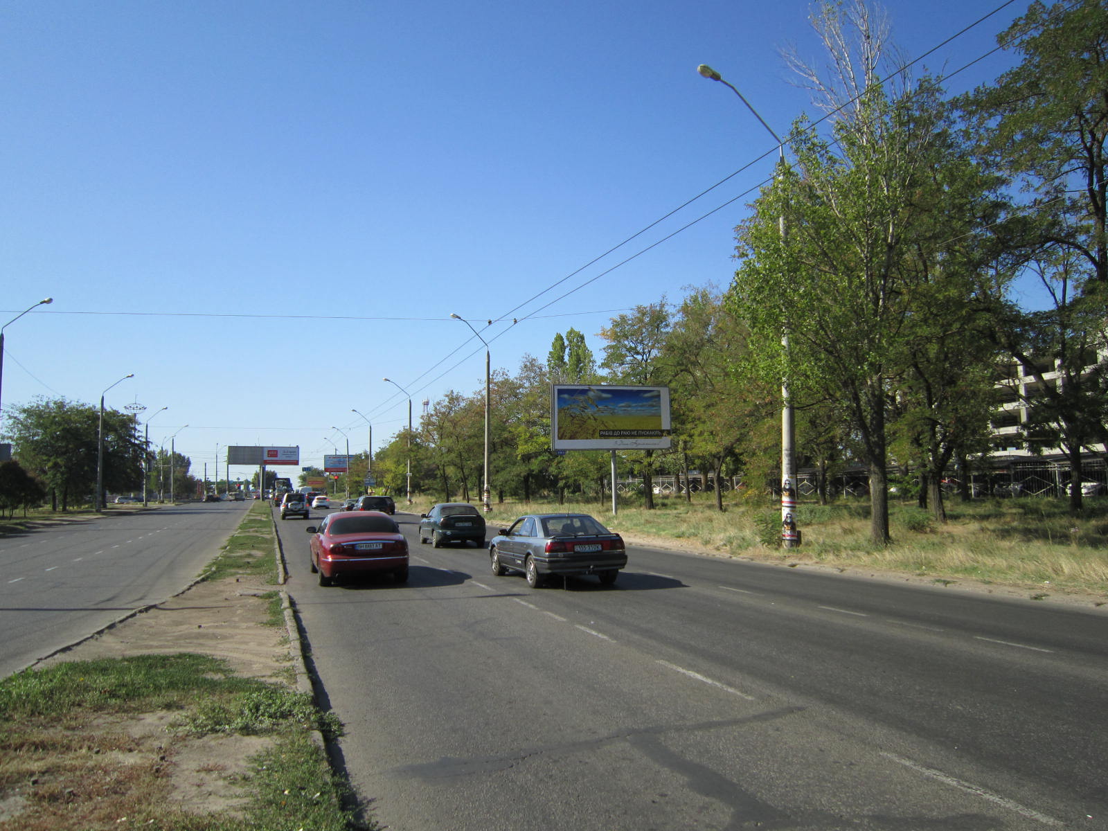 Фото рекламної площини  просп. Маршала Жукова, 91-А (біля автостоянки № 3)