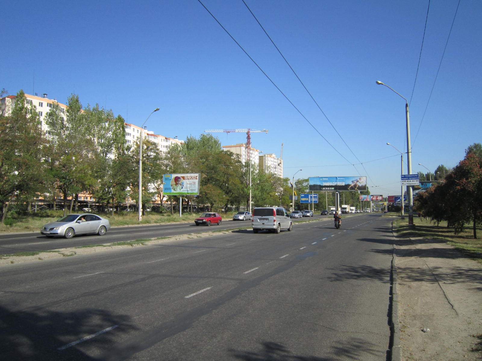 Фото рекламної площини  просп. Маршала Жукова, 91-А (біля автостоянки № 3)